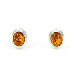 Open back oval amber earrings set in silver really highlight the amber inclusions.