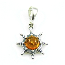 Beautiful honey amber sphere suspended by a sterling silver attachment.