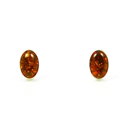 Honey amber oval earrings framed with Sterling Silver.