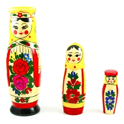 This cute 3 piece nesting doll is from the village of Semyonov, Each of the pieces are brightly painted and cheerfully drawn. The tallest girl is 8 inches tall. The girl doll opens to a girl, then a smaller girl.