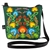 Fully lined Polish paper cut design shoulder purse. 23" long cord strap. Purse size 7.5" x 6.5" - 19cm x 17cm. Zippered closure. Design on one side only with a forest green background. Made of 100% polyester.