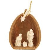 The meaning of CHRISTmas in a nutshell! Looking for a distinguishing or distinctively beautiful gift? This plastic nutshell ornament houses Mary, Joseph and the Christ child with a star above. Made in Germany, this nutshell with nativity ornament comes re