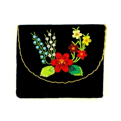 Hand beaded purse made from velvet. Fully lined. Extra long strap. Snap closure. Made in Lowicz, Poland.
Floral designs vary from purse to purse.