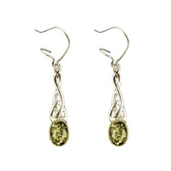These genuine green color  Baltic Amber earrings are beautifully encased in a Celtic Sterling Silver design.