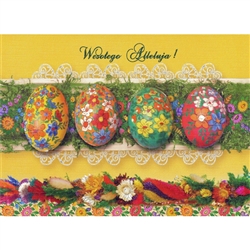 Beautiful glossy Easter card featuring four decorated eggs above a layer of Polish Easter palms.
Wesolego Alluluja greeting. Blank on the inside.
