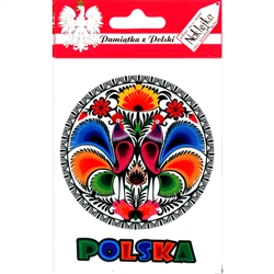 Polish paper cut featuring roosters on a round sticker and the word Polska (Poland) underneath.  The sticker peels off the glossy
paper backing in two parts: 1. The round paper cut and  2.The word Polska.  This is thin material so peel carefully.