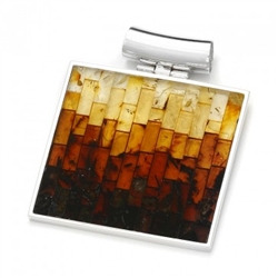 Stunning pendant with multi-color mosaic amber. The process to create this amber mosaic is quite unique. See the video below.