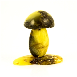 We are aware of only one artist in Poland making these delightful mushrooms from amber. Naturally shaped with pure raw Baltic amber.