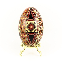 This beautifully designed and executed goose egg is hand painted by our artist from Canada using the traditional batik method. The egg has been emptied through two small holes at each end of the egg.