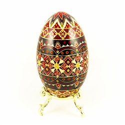 This beautifully designed and executed goose egg is hand painted by our artist from Canada using the traditional batik method. The egg has been emptied through two small holes at each end of the egg.