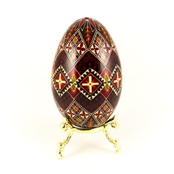 This beautifully designed and executed turkey egg is hand painted by our artist from Canada using the traditional batik method. The egg has been emptied through two small holes at each end of the egg. Stand sold separately.