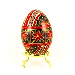 This beautifully designed and executed turkey egg is hand painted by our artist from Canada using the traditional batik method. The egg has been emptied through two small holes at each end of the egg. Stand sold separately.