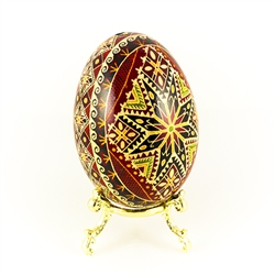 This beautifully designed and executed turkey egg is hand painted by our artist from Canada using the traditional batik method. The egg has been emptied through two small holes at each end of the egg. Stand sold separately.