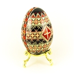 This beautifully designed and executed turkey egg is hand painted by our artist from Canada using the traditional batik method. The egg has been emptied through two small holes at each end of the egg. Stand sold separately.