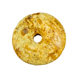 Lovely semi-polished doughnut shaped butterscotch amber stone for pendant use. Weighs 6.3g.