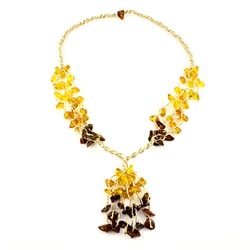 This beautiful amber necklace showcases a variety of amber shades. The beauty of this necklace will last a lifetime. Knotted between each bead..