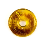 Very impressive polished doughnut shaped honey amber stone for pendant use. Weighs 4.9g. This amber stone is mainly polished but also has natural rough spots to highlight its natural origins.