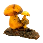 We are aware of only one artist in Poland making these delightful mushrooms from amber. Naturally shaped with pure raw Baltic amber.