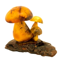 We are aware of only one artist in Poland making these delightful mushrooms from amber. Naturally shaped with pure raw Baltic amber.