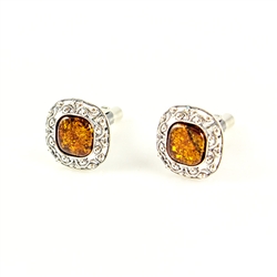 Beautiful pair of thin silver cuff links with centers of amber.