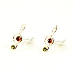 Beautiful pair of Clef note shaped silver cuff links highlighted with two shades of amber.  Perfect gift for your favorite musical friend.