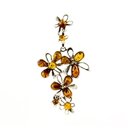 Golden drops of amber highlight this delightful sterling silver pendant.