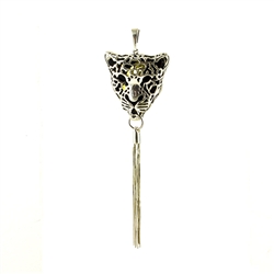 A sterling silver cheetah holding an amber cabochon inside. Sterling silver tassels finish off this most intriguing pendant.