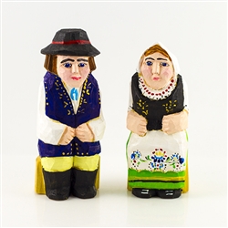 Hand carved and painted by folk artist Tadeusz Lesniak, our little couple is dressed in Kashubian costume from Northern Poland.