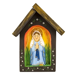 All over the Polish countryside you can find wonderful religious roadside shrines.  The folk carving of Mary is reminiscent in shape and style to those shrines.  Hand carved and painted by folk artist Bogumila Lesniak. Ready to hang.