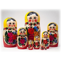 This cute 9 piece nesting doll is from the village of Semyonov.. Each of the pieces are brightly painted and cheerfully drawn. She stands over 8" tall.