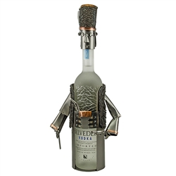 Hand made metal bottle holder of the famous mountaineer robbers known as Zbojnik.  The beautiful holder is designed to fit half liter and .750ml liquor bottles.  Composed of a base and a cap for the top of the bottle. Bottle diameter should not exceed 3"