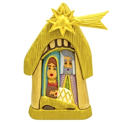 The Christmas Nativity carved and painted by Polish folk artist Andrzej Cichon from Kutno. Mr Cichon signs his work by carving a stylized version of his initials on the bottom of this carving.  Carved from one block of wood (approx 11.5" x 6.5" x 3").  Sh