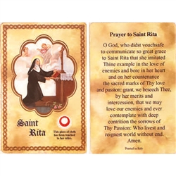 St Rita Holy Card This unique prayer card contains a third class relics on the front with the prayer on the back. Please note that these are third class relics and are not first or second class with a piece of cloth touched to the relics.