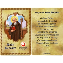 St Benedict Holy Card This unique prayer card contains a third class relics on the front with the prayer on the back. Please note that these are third class relics and are not first or second class with a piece of cloth touched to the relics.