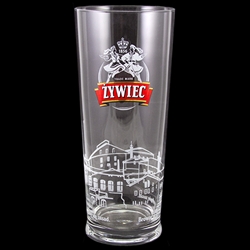 Zywiec beer is one of Poland's most popular and oldest brands. This is a 1/2 liter capacity tall glass glass featuring the company's logo with dancers as well as a factory profile around the bottom of the glass and the company motto: "Trzymamy Sie Zasad"