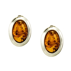 Honey amber in silver frames.  Size is approx .6" x .5".