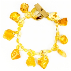 Bozena Przytocka is a designer of artistic amber jewelry based in Gdansk, Poland. Here is a beautiful example of her ability to blend a variety of amber shapes to create a stunning bracelet.