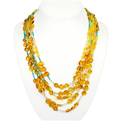 Bozena Przytocka is a designer of artistic amber jewelry based in Gdansk, Poland. Here is a beautiful example of her ability to blend amber, crystals and turquoise to create a stunning necklace.
