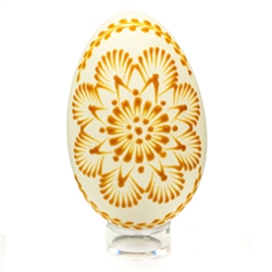 This beautifully designed egg is "painted" with pure beeswax using the "drop pull" technique.  The wax design is left on the egg.
We have a variety of designs and no two are exactly alike. The goose eggs have been emptied.  Hand made in Poland.