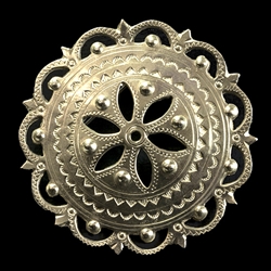 This Highlander pin is normally worn in the center of the man's shirt. Hand worked from metal with intricate detailing by one master artisan in Bukowina near Zakopane. The workmanship is exquisite and the detail so rich these decorations have become colle