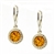 Beautifully designed classic silver setting for these honey shaded amber stones.  Sterling silver open hooks.