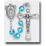 Polish Art Center - 20.5"  7mm Aqua Tin Cut, Multi Faceted Crystal Round Beads with Aurora Borealis and Deluxe Silver Oxidized Crucifix and Center.  It comes with a Deluxe Velvet Box