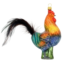 Cock-a-doodle-doo! Do you have a branch on your tree for this proud bird to roost? Chest puffed out and head held high, our 4½" tall glass rooster is accented with a real feather tail. Hand-painted with vibrant glazes and shimmering glitter accents, this