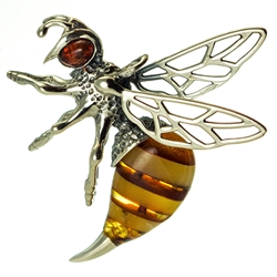 Hand made with Sterling Silver detail. Each piece is unique. Color and shades of amber will vary.  Size is approx 1.5" x 1.5"