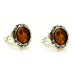 Beautiful pair of thin silver cuff links with centers of amber.
