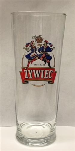 Zywiec beer is one of Poland's most popular and oldest brands. This is a 1/2 liter capacity tall glass glass featuring the company's logo with Krakow dancers . Hand wash only.