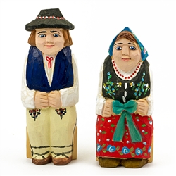 Hand carved and painted by folk artist Tadeusz Lesniak, our little couple is dressed in Goral costumes from southern Poland.