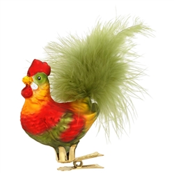 Forget the ho-ho-ho this Christmas! A cock-a-doodle-doo will do with our whimsical rooster ornament! This exceptional ornament was mouth-blown and hand-painted by skilled artists in Poland using vivid glazes in festive hues. With a tail made of real soft