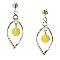 Custard amber balls suspended in artistic sterling silver.  Keep in mind that custard shades vary and contain streaks of both yellow and white.