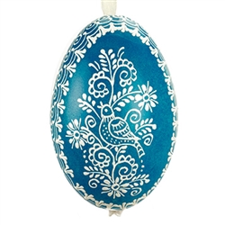 This beautifully designed egg is dyed one color, then white wax is melted and applied to form an intricate design which is left on the surfce. The egg is emptied and strung with ribbon for hanging or you can remove the ribbon. This is the work of master